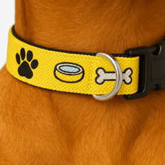 Close-up of Emoji Munch Dog Collar by PawTaaka featuring bold paw, bone, and bowl icons on durable yellow nylon.