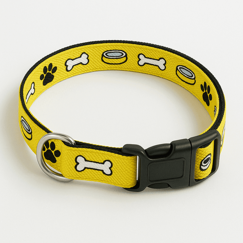 Emoji Munch Dog Collar by PawTaaka displayed flat, highlighting its bright yellow color and fun pet-themed icons.