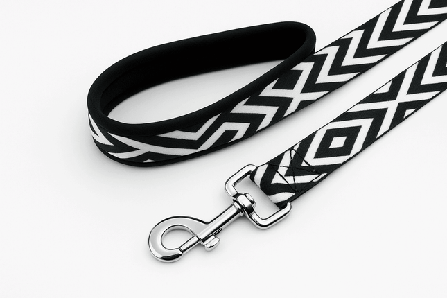 PawTaaka Monochrome Zigzag Dog Leash in black and white with padded handle and heavy-duty clasp for secure and comfortable pet walks.