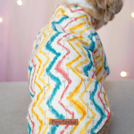 Kurta + Rakhi Combo for Dogs – Celebrate Rakhi in Style with this colorful festive kurta featuring zigzag patterns, worn by a small dog.
