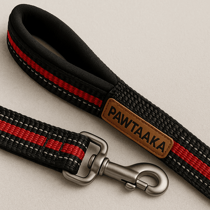 Close-up of PawTaaka Midnight Stride Reflective Dog Leash showing soft padded handle, black & red nylon grip, and sturdy metal clasp.