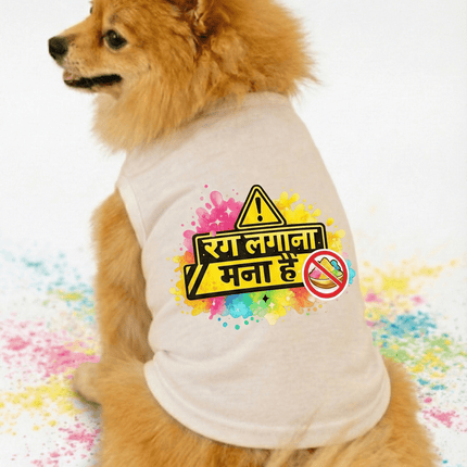 Small dog wearing a white shirt with colorful text and symbols on a white background