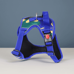 Camo Burst Reflective Dog Vest Harness – Blue Jungle by PawTaaka displayed on tabletop, highlighting its vibrant camo design and sturdy build.